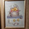 Framed cross stitch artwork of a funny kitten on a yoga mat with tiny props and colorful details