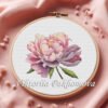 Peony flower cross stitch pattern in embroidery hoop with purple and pink petals