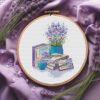 lavender cross stitch pattern with books and tea
