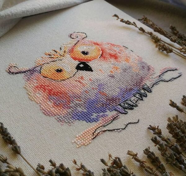 79355885_2485072238227910_8517422212465033216_o Whimsical orange owl cross stitch artwork with lavender decor, vibrant handmade embroidery