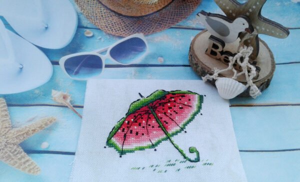 BwIPTReul3w embroidery with watermelon colors and playful umbrella design