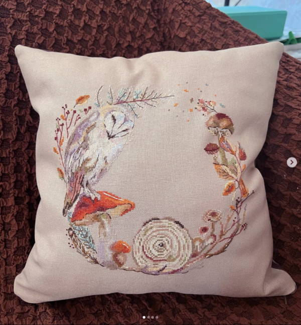 Decorative pillow with barn owl and mushroom wreath cross stitch design, cozy autumn home decor