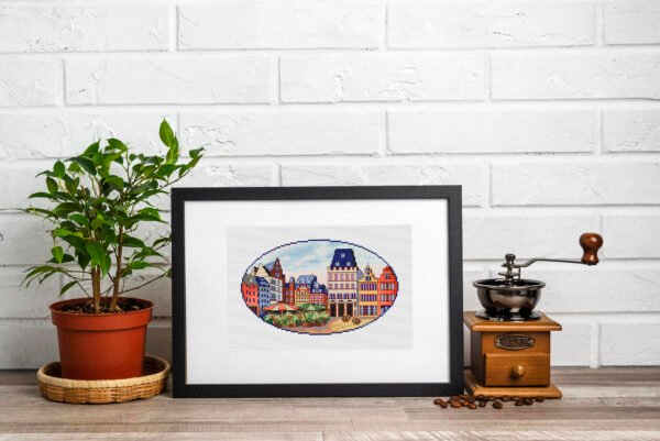 Colorful Trier city cross stitch artwork displayed with vintage decor, European architecture embroidery