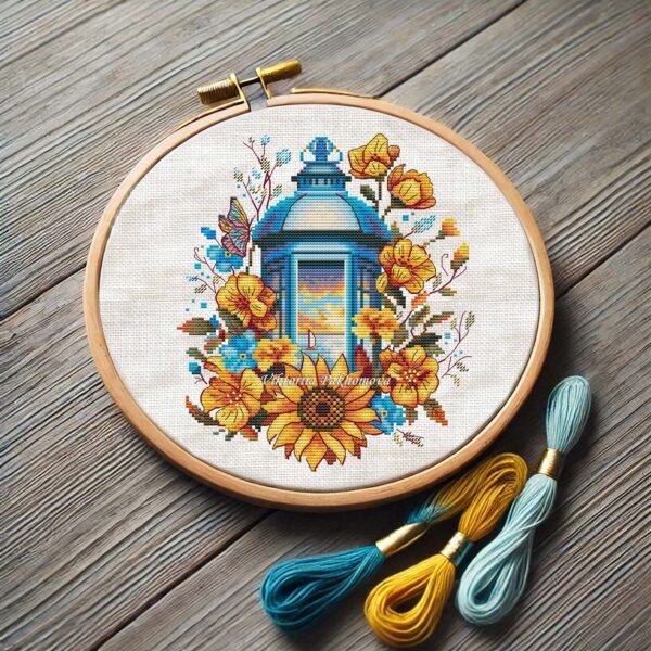 lantern cross stitch pattern with blue and yellow flowers