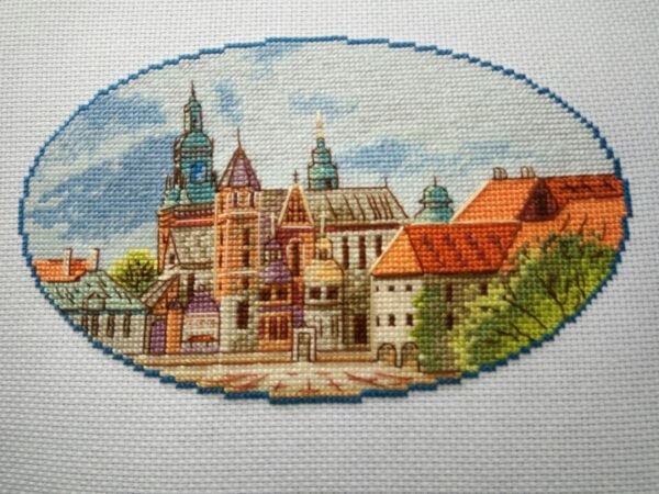 Krakow city cross stitch artwork with historic European buildings, vibrant architecture embroidery