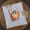 cross stitch artwork of a Viking‑themed ginger cat with expressive details and warm colors.