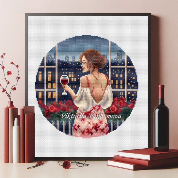 mock up frame with r Finished embroidery of woman with wine overlooking night city — cross stitch artwork