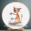 Cross stitch embroidery of a funny ginger cat holding a coffee cup with bright expressive details, displayed in a wooden hoop