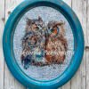 Framed romantic owls cross stitch design with warm colors, expressive bird couple embroidery