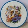 Валерия Петку Spring bee cross stitch pattern in a wooden hoop with colorful flowers and honeycomb details