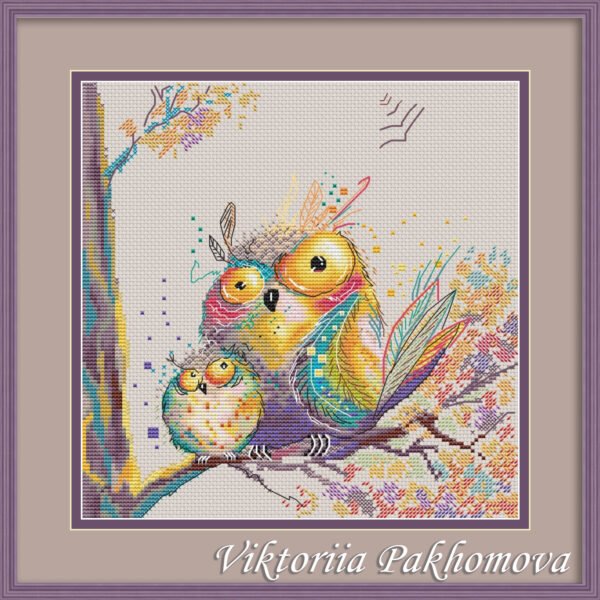 подпись Framed cross stitch artwork of two colorful whimsical owls with bright autumn tones