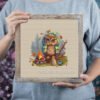 Framed cross stitch of a funny owl in a forest camping scene with warm autumn colors