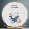 131 Cross stitch embroidery of a Baby Aquarius zodiac birth announcement with space for name, date and stats in a wooden hoop