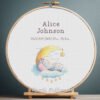 131 Cross stitch embroidery of a personalized baby elephant birth announcement displayed in a wooden hoop with custom newborn details