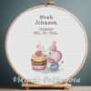 Cross stitch embroidery of a baby elephant 1st birthday design displayed in a wooden hoop with customizable details