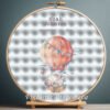 131 Cross stitch embroidery of a personalized elephant and bunny birth announcement displayed in a wooden hoop with custom newborn details