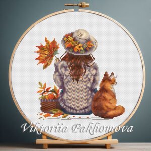 Autumn cat and girl cross stitch pattern in wooden hoop – warm fall embroidery design