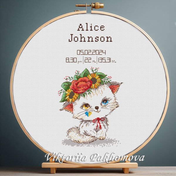 Cross stitch embroidery of a Baby Kitty design for a newborn girl with space for name, date and stats in a wooden hoop