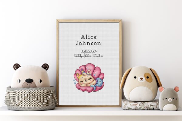 Framed Mermaid Cat cross stitch birth announcement with ocean colors and personalized baby details