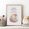 Framed sleeping bunny birth announcement cross stitch featuring personalized name, date and stats for nursery décor.