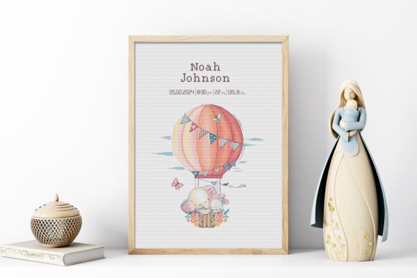 164 Framed elephant and bunny birth announcement cross stitch featuring personalized name, date and stats for nursery décor.
