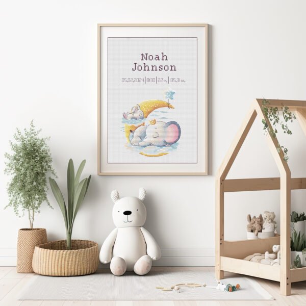 Framed bunny and elephant birth record cross stitch featuring personalized baby name, date and stats for nursery décor.