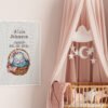 Framed baby girl birth announcement cross stitch featuring a sleeping bunny and personalized newborn details
