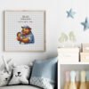 Framed Teddy Bear cross stitch birth announcement with pastel colors and personalized baby details