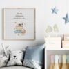 Framed Baby Aries cross stitch birth announcement with pastel colors and personalized baby details