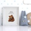 Framed Mother Bear cross stitch birth announcement with soft woodland colors and personalized baby details