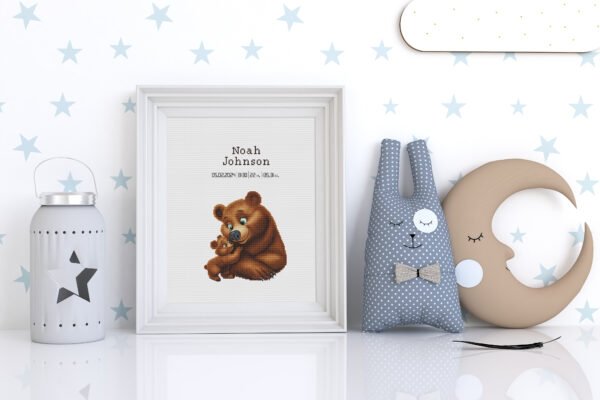 Framed Mother Bear cross stitch birth announcement with soft woodland colors and personalized baby details