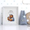 Framed Teddy Bear cross stitch birth announcement with pastel colors and personalized baby details