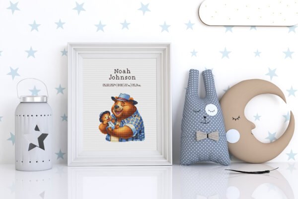 Framed Teddy Bear cross stitch birth announcement with pastel colors and personalized baby details
