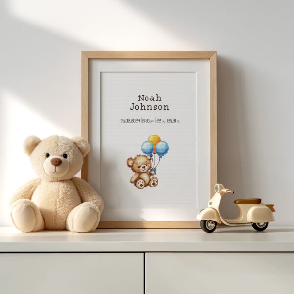 Framed Teddy Bear cross stitch birth announcement with pastel colors and personalized baby details