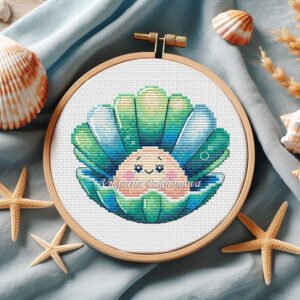 Cute baby scallop cross stitch pattern in colorful ocean tones inside embroidery hoop