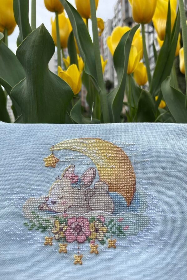 finished embroidery of sleeping bunny cross stitch pattern