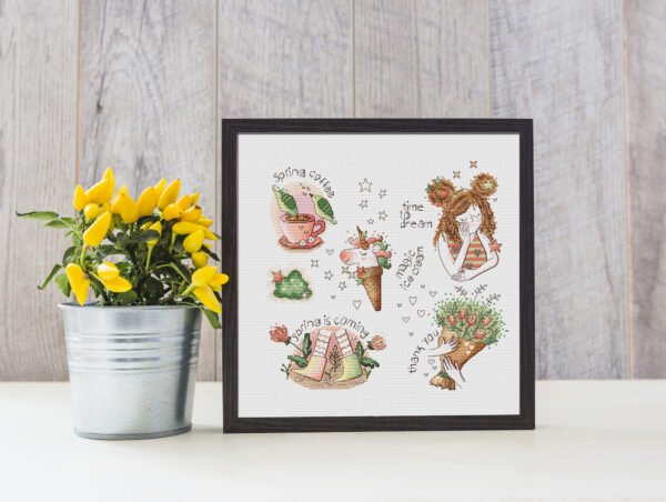 Framed spring sampler cross stitch featuring magic ice cream, coffee cup, floral boots, bouquet and a cute girl with “time to dream” text.