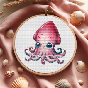 Cute baby squid cross stitch pattern in pastel ocean colors inside embroidery hoop