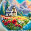 Framed cross stitch artwork showing a glass ball with a poppy field, warm sky and a small house