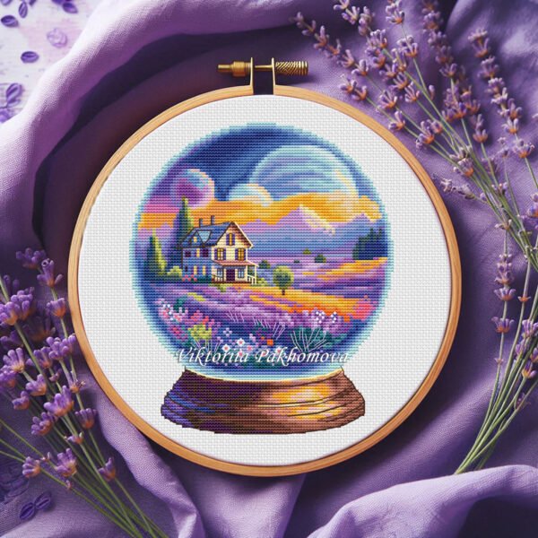 screen Cross stitch embroidery of a lavender glass ball scene with a house and summer colors in a wooden hoop