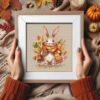 36 Autumn bunny cross stitch pattern in a wooden frame, woodland rabbit with a basket of mushrooms and autumn leaves