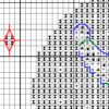 Close‑up of wolf and moon cross stitch chart fragment – detailed stitches and warm colors